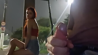 Public Masturbation: Emely'S Risky Handjob On A Redhead At The Bus Stop