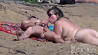 Hidden Camera Captures Oral Sex On A Nudist Beach